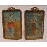 A pair of 19th century hand painted miniatures of ladies in the countryside in gilt metal frames,