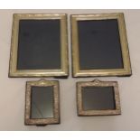 Four hallmarked silver rectangular photograph frames