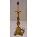 A carved gilded wooden lamp base, decorated with leaves and scrolls, 58cm (h)