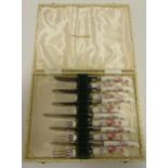 A cased set of Royal Crown Derby porcelain handled dessert eaters for six place settings