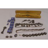 A quantity of costume jewellery to include bracelets, necklaces and a wristwatch