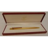 Must de Cartier gold plated ballpoint pen in original packaging