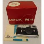 Leica M4 camera in original packaging to include documents