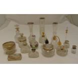 Thirteen dressing table bottles, decanters and vase with silver mounts, A/F