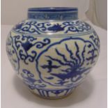 A Ming style blue and white baluster vase decorated with stylised dragons, bats and phoenix, 23cm (