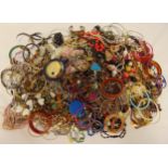 A quantity of costume jewellery to include necklaces, pendants, bangles and bracelets