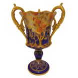 Royal Crown Derby three handled loving cup, Peach Tree design, blue ground, the knopped stem on