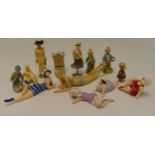 A quantity of collectable miniature dolls of varying size and style (13)