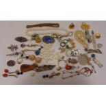 A quantity of costume jewellery to include necklaces, a wristwatch, rings and brooches