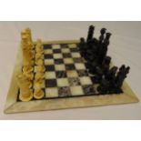 A composition chess set to include a marble chess board