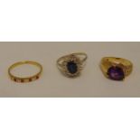 Three 18ct gold rings set with various stones, approx total weight 9.4g