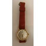 Delma 9ct gold gentlemans wristwatch on a replacement leather strap