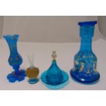 A quantity of blue continental glassware to include a flask, a vase and two containers