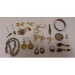 A quantity of costume jewellery to include necklaces, earrings and a ring