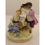 Meissen figural group of a girl and boy holding flowers on raised circular base, marks to the