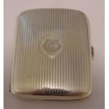 A hallmarked silver engine turned cigarette case, approx total weight 93g