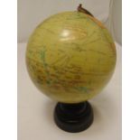 A Geographic Terrestrial Globe on raised circular stand, 38cm (h)