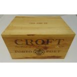 A case of twelve 75cl bottles of Crofts Quinta Da Roeda 1983 vintage port