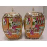 A pair of Chinese Cantonese ginger jars, the sides decorated with figures in interior scenes, the