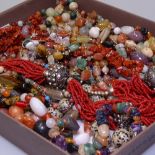 A tray of stone set costume necklaces