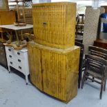 A burr-walnut veneered Art Deco style 4-door cocktail cabinet, W100cm, H171cm