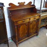 A Regency mahogany chiffonier, with raised shaped back, 2 frieze drawers, cupboards under, with