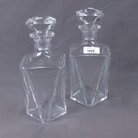 A pair of Baccarat glass decanters and stoppers, height 23.5cm