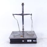 An Avery Apothecary's plated balance scale to weight 2oz, with drawer under, height 37cm