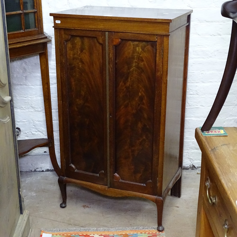 An Edwardian mahogany side cabinet, 2 shaped panelled doors, on cabriole legs, W61cm, H109cm, D40cm