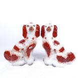 A pair of Staffordshire mantel Spaniels, 31.5cm