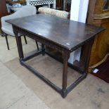 An 18th century joined oak serving table, with plank-top, Arcadian card frieze, on baluster turned