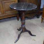 A George III oak tripod table, H69cm