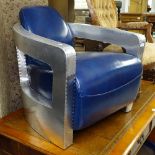 An aviator pilot chair, in riveted aluminium and blue leather