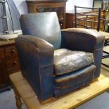 An early 20th century leather upholstered Club chair