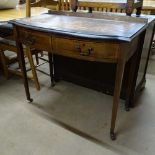 An Edwardian mahogany bow-front writing table, with brown leather skiver, 2 satinwood-banded