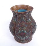 A small Chinese cloisonne enamelled brass lobed vase, floral decoration, height 9.5cm
