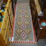 A Choli Kilim runner, 240cm x 80cm