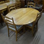 An Ercol "Southwold" honey elm oval dining table, L165cm, together with a set of 4 Ercol "Penn"