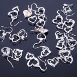 11 pairs of silver heart design earrings