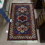 A Blue ground Shiraz rug, 150cm x 90cm