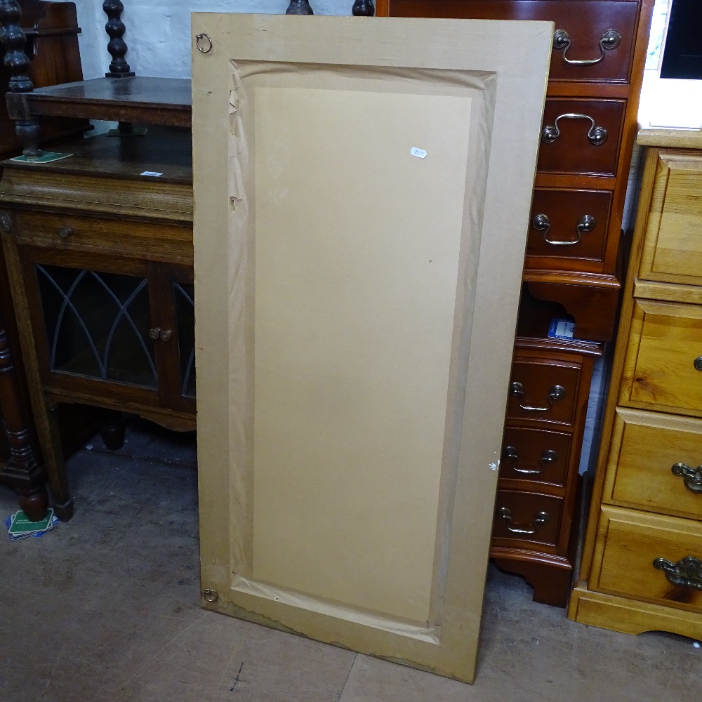 A modern embossed gilt-framed rectangular wall mirror, 57cm x 116cm - Image 2 of 2