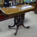 A Victorian burr-walnut fold over card table, on quadruple cluster column and sabre leg base, W92cm,