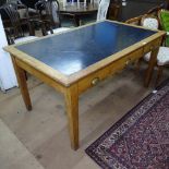 An early 20th century oak writing desk, 3 frieze drawers, on square tapered legs, L153cm, H75cm,