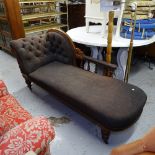 A 19th century carved mahogany-framed chaise longue, with buttoned-back upholstery, on turned