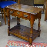 A 17th century style joined oak stool/side table, single drawer, turned baluster legs and under-