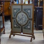 An Edwardian firescreen with woolwork panel, W58cm, H84cm