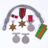 A group of 4 George VI Second World War Service medals, comprising GSM, Defence, Burma Star, a