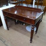 A Victorian mahogany writing table, 3 frieze drawers, raised on turned legs, L106cm, H81cm, D56cm