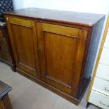 A 19th century mahogany fitted linen cupboard, with 2 panelled doors, on plinth base, W103cm,