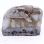 A Chinese carved and polished agate diorama carving, depicting sages at a table, length 13cm